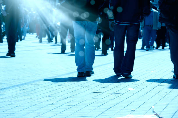 istock Close up people walking on busy street 1049189674