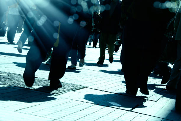 istock Close up people walking on busy street 1049189880