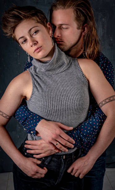 istock Young affectionate couple. He kisses her. 1049192576