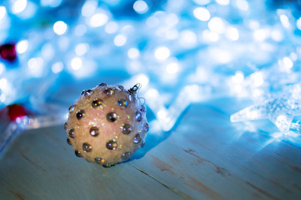 istock Sparkling Christmas lights with Christmas ornament 1049192604
