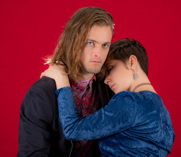 istock Young affectionate couple . She rests on his shoulder. 1049195008