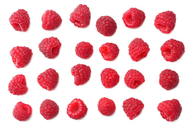 istock ripe raspberries isolated on white background. top view 1049201116
