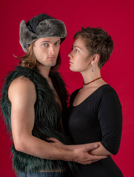 istock Young affectionate couple . She looks at him. 1049201758