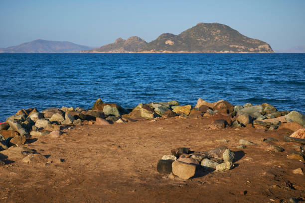 istock Rocks on shore of Aegean sea 1049204618