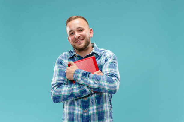 istock Businessman hugging laptop 1049205086