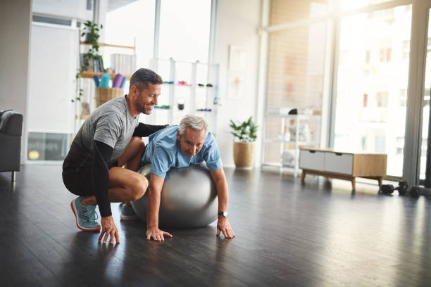 istock Guiding him to take control of his own body 1049207462