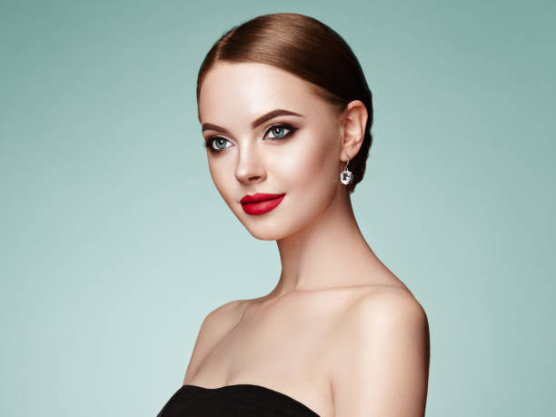 istock Beautiful woman face with perfect makeup 1049208146