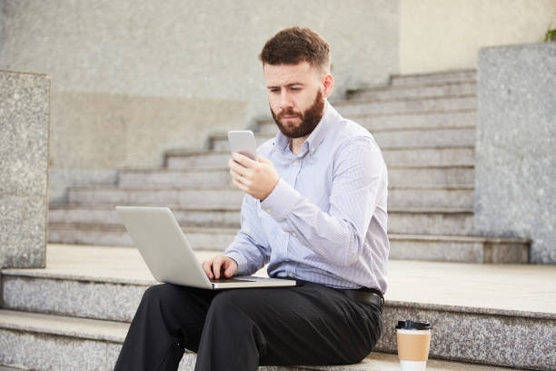 istock Businessman texting colleague 1049211304