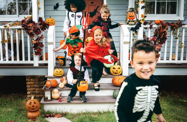 istock Little kids trick or treating 1049217040