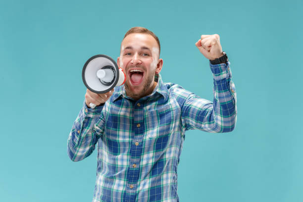 istock man making announcement with megaphone 1049217108