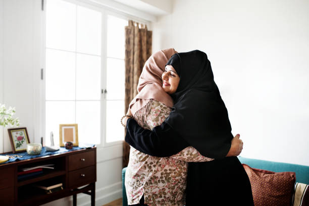 istock Muslim women hugging each other 1049219928