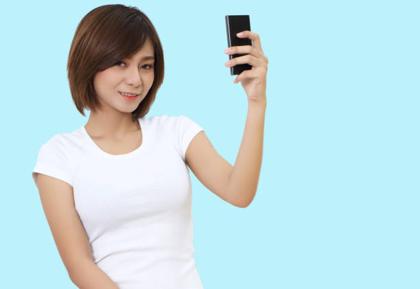 istock woman and smart phone 1049227132