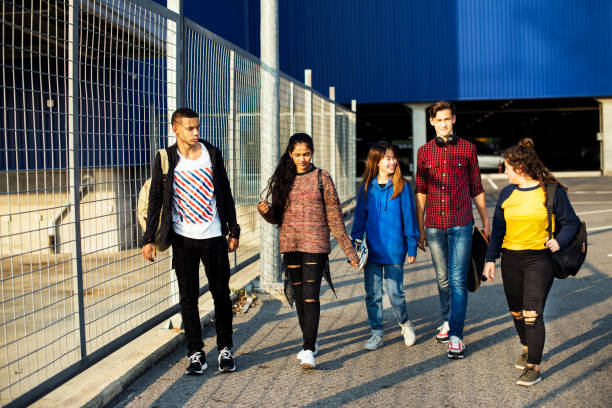 istock Group of school friends outdoors lifestyle 1049229824