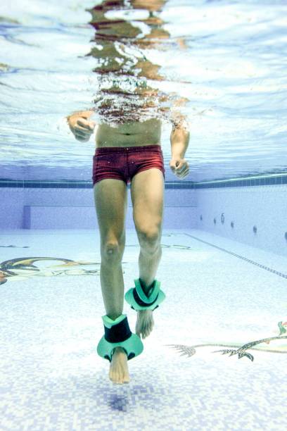 istock People in and under water during Auqa training 1049238368