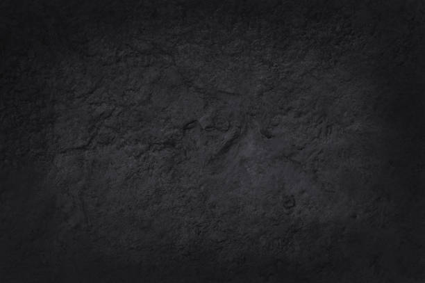 istock Dark grey black slate texture in natural pattern with high resolution for background and design art work. Black stone wall. 1049239634