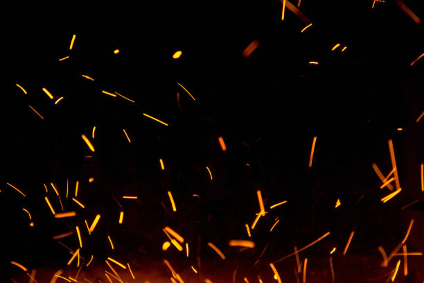 istock Fire sparks in the air near the fireplace 1049241504
