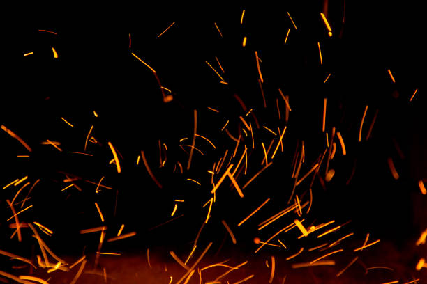istock Fire sparks in the air near the forge blured 1049241586
