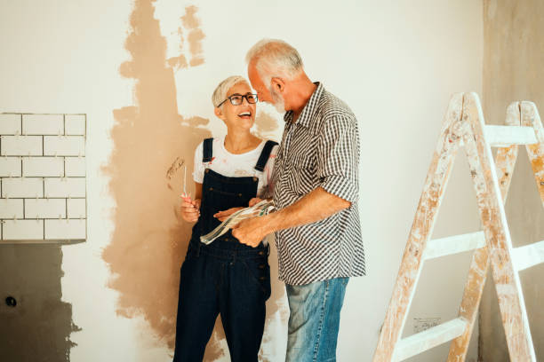 istock Couple remodeling their home 1049241626