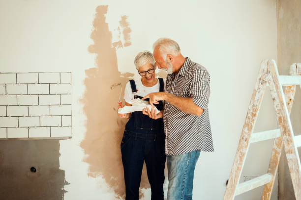 istock Couple remodeling their home 1049241828