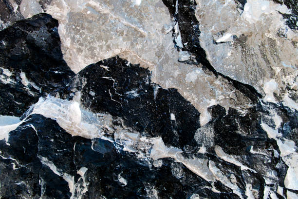 istock Surface of rocks as a background 1049241918