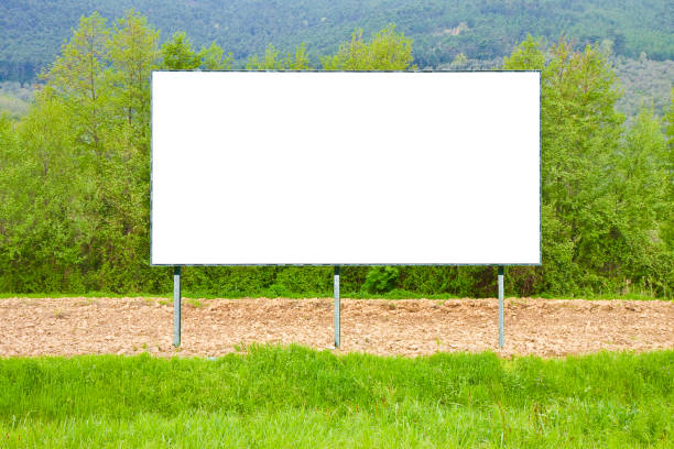 istock Blank commercial advertising billboard immersed in a rural scene - image with copy space 1049242160