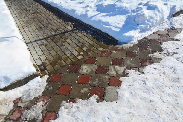 istock Snow shoveling footpath after snowfall 1049245212