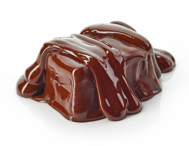 istock piece of chocolate covered with melted chocolate 1049251606