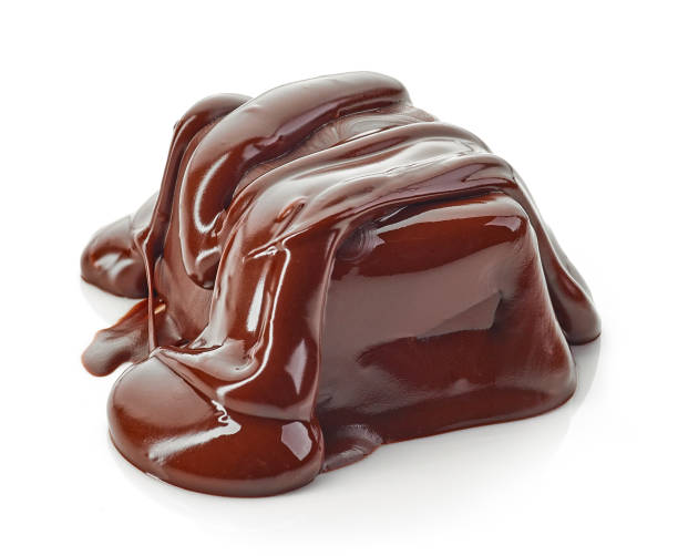 istock piece of chocolate covered with melted chocolate 1049251608