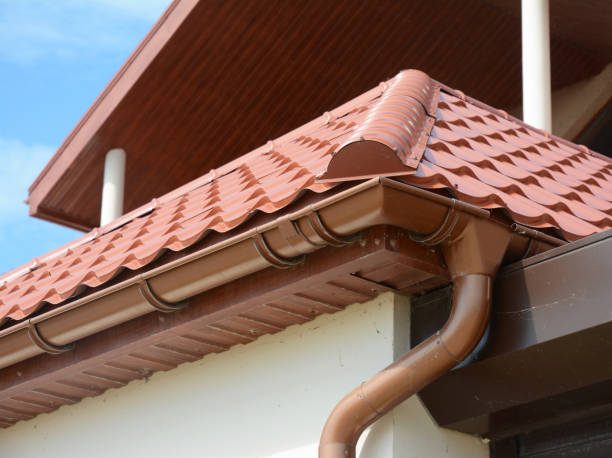 istock Home guttering, soffit, fascia, plastic guttering system, guttering & drainage pipe exterior. Roofing repair. Problem areas for rain gutter waterproofing outdoor. 1049251998