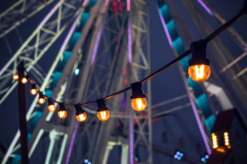 Festive lights decorated at Christmas fair winter wonderland in London