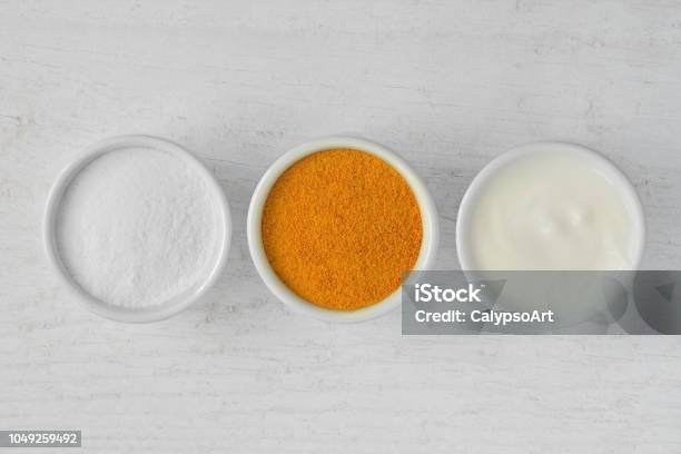 Homemade Face Mask Made Out Of Rice Flour Turmeric And Yogurt Stock Photo - Download Image Now