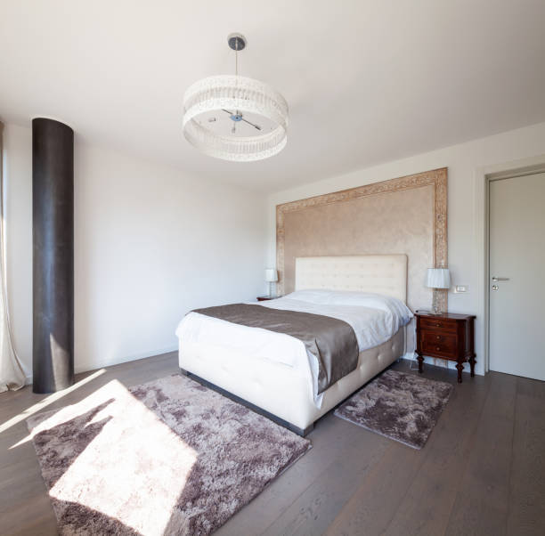 istock Elegant bedroom in modern apartment 1049263348