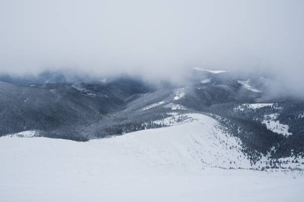 istock Cloudy winter weather in the mountains 1049265718