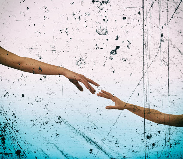 istock Grunge style close up hands reaching each other 1049265958