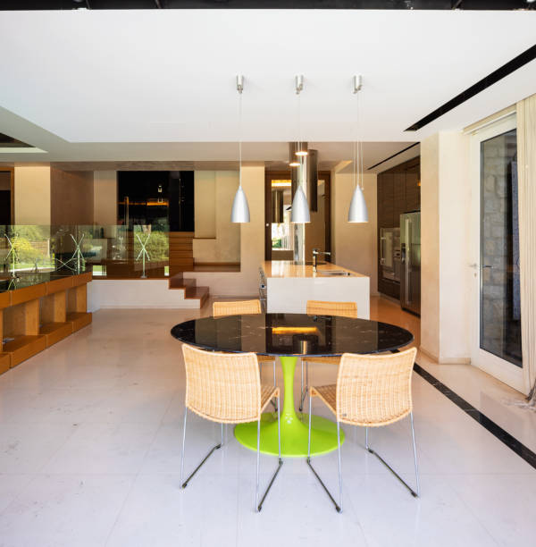 istock Modern kitchen in wood and marble with island 1049267304