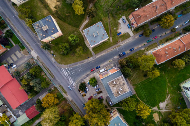 istock Flying over city area crossroads 1049267736