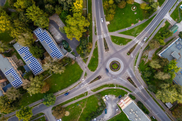 Flying over city area roundabout