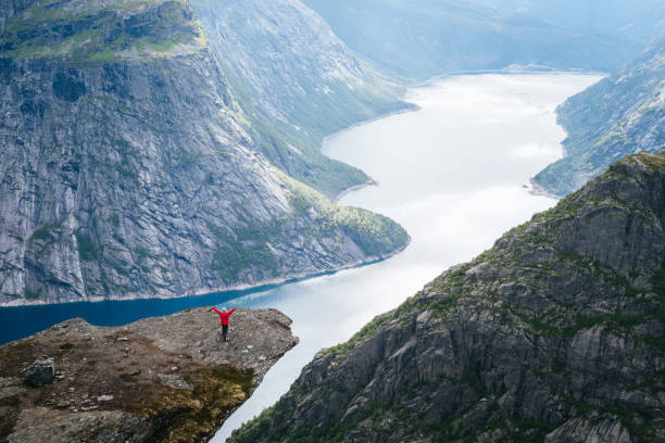 istock Trolltunga Rock and Ringedalsvatnet lake in Norway 1049273522