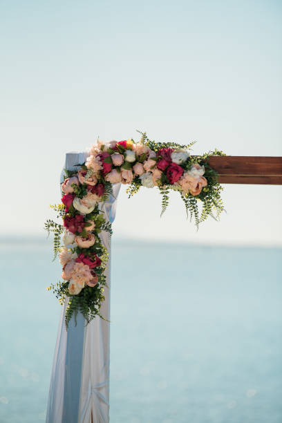 istock Wedding Day Flower Arbour Seaside wedding 1049273530