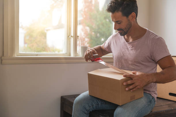 istock A man moving into a new home 1049273760
