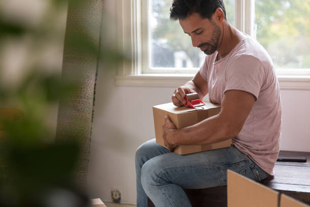 istock A man moving into a new home 1049273848