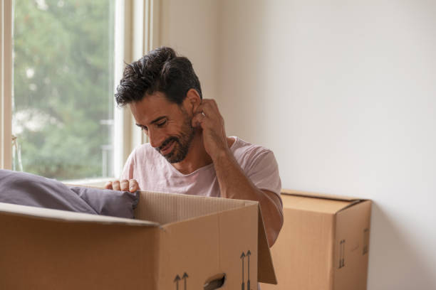 istock A man moving into a new home 1049273952