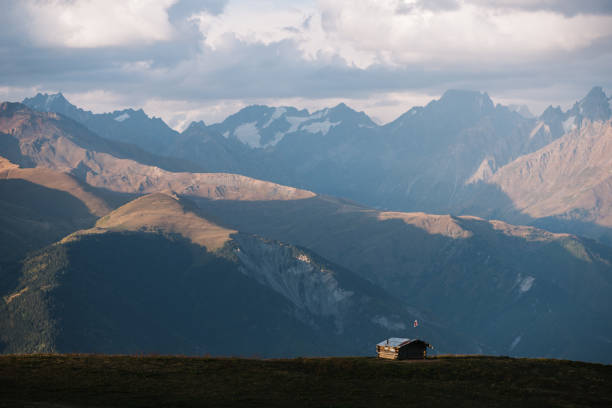 A single wooden mountain hut with copy space