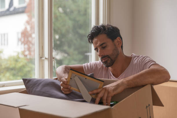 istock A man moving into a new home 1049274160