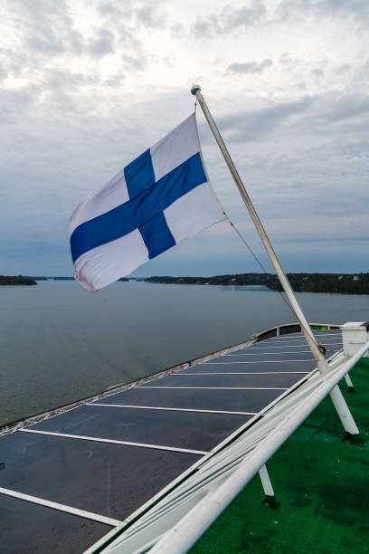 istock Finnish flag on a car ferry 1049277340