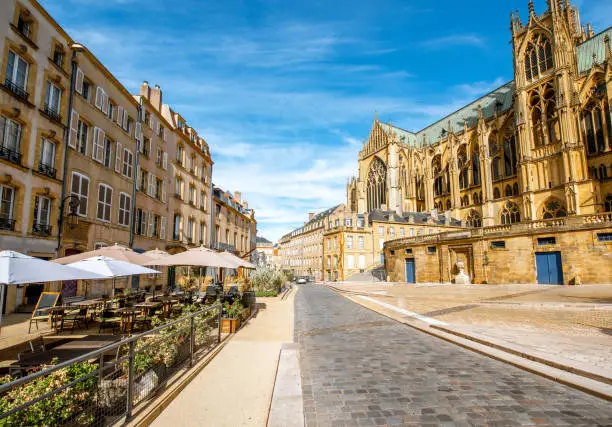 Street view on the central square with famous cathedral in Metz city in Lorraine region of France