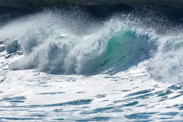 istock Sunlight over Surf, Fistral Beach, Cornwall 1049277476