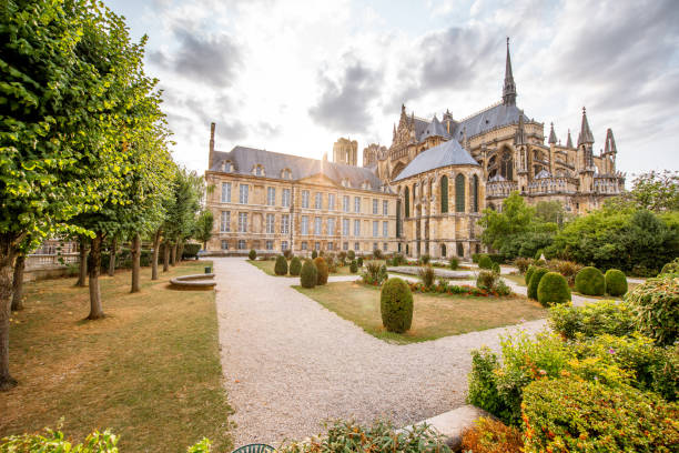 Gardens in Reims city, France Reims gardens on the backyard of Notre-Dame cathedral in France champagne region photos stock pictures, royalty-free photos & images