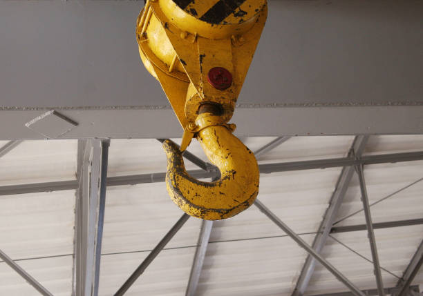 istock Swivel electric crane hook for overhead crane in the workshop 1049278348