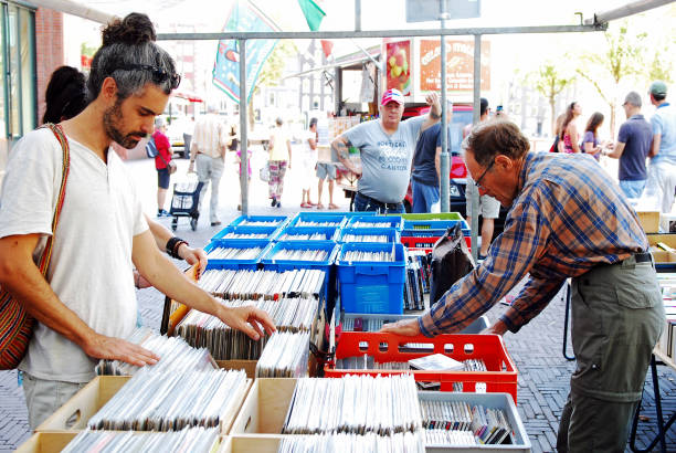 Shot of a young woman shopping for vinyl records at a store